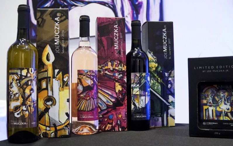 Wine bottles and gift box with labels based on motifs by Joe Muczka jr.