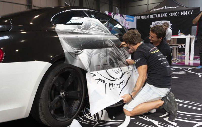 Wrapping a sports car with a motif by Joe Muczka jr.